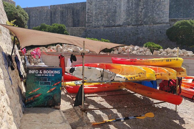 Adventure Dalmatia - Sunset Sea Kayaking & Snorkelling Dubrovnik - Paddling beneath the city walls