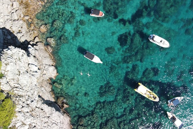 Blue & Green cave,Šunj beach - with drinks small group speedboat - Price, timing, and what you receive for $78.64