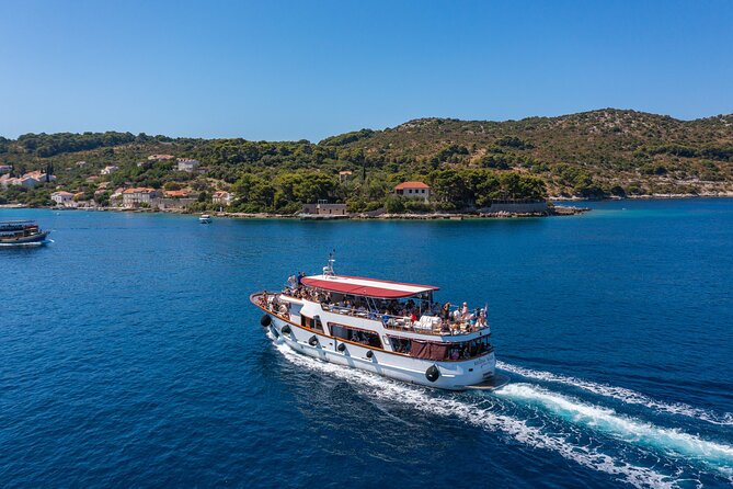 Dubrovnik: Elaphiti Islands Full-Day Cruise with Lunch - Koločep: pine trees, clear water, and a short first look