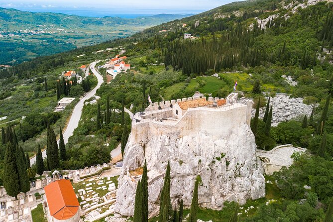 Rural Biking & Wine Tasting Tour in Dubrovnik - Walking through Sokol fortress