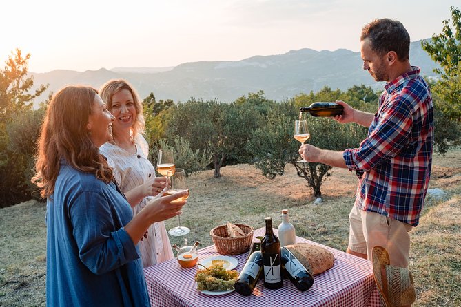 Sunset wine tasting in vineyard - Olive oil, bread, and homemade treats